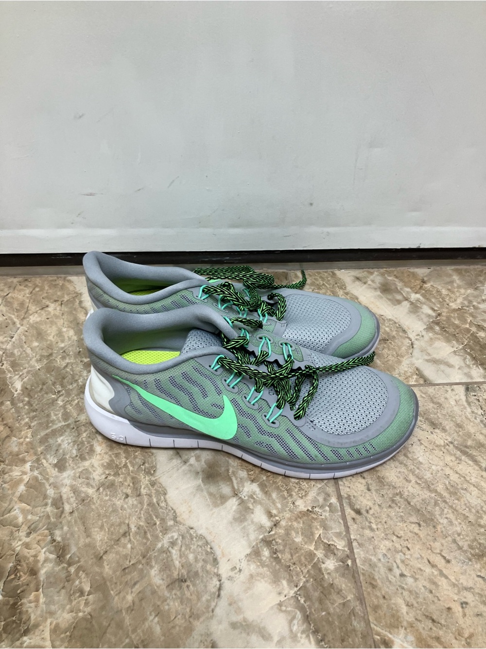 Grey and green Nike 5.0 Free runs size 7